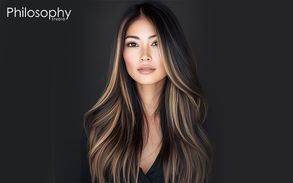 Asian woman with brown highlights
