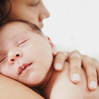 Mother Holding Baby_edited.jpg