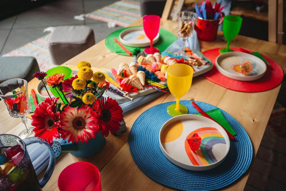 Bright and fun picnic setup with rainbow colors by Sunkissed Design & Co.
