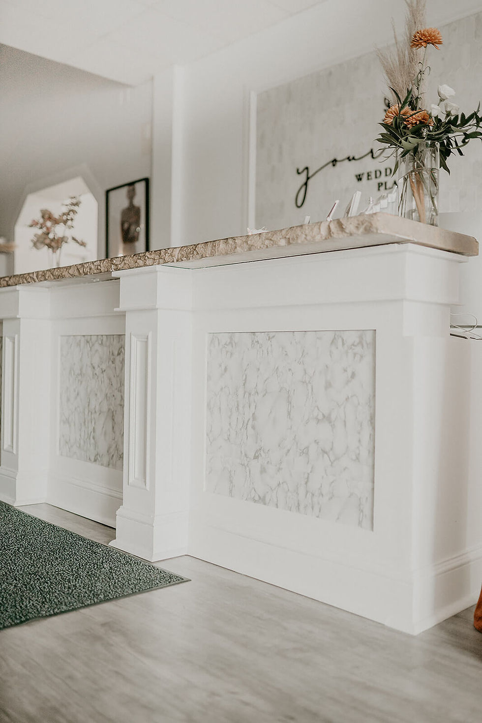 Reception area at Your Wedding Place with a consultant ready to assist brides and grads