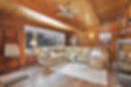 Staged living room with decluttered space and modern decor, creating a more cohesive and visually appealing design.