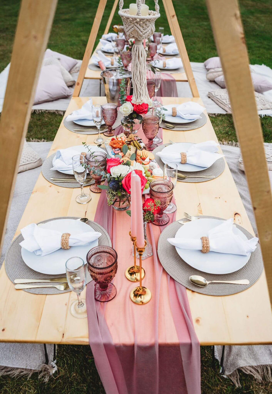 Elegant picnic setup with pink and white roses by Sunkissed Design & Co.