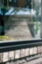 Dutchess Flower Company sidewalk signage and A-frame chalkboard reading 'Fresh Flowers, House Plants, Home Décor