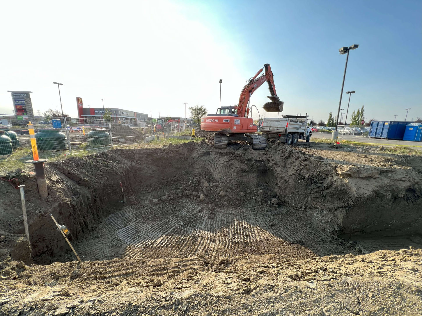 Ground excavation for Jiffy Lube renovation project by Hawi Construction.