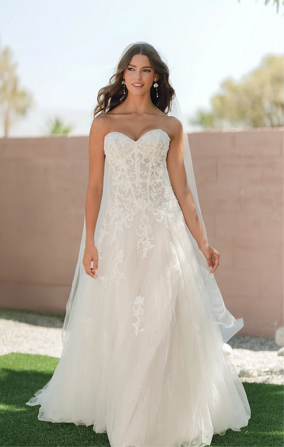 Wedding gown with tulle train from the gown collection carousel at Your Wedding Place