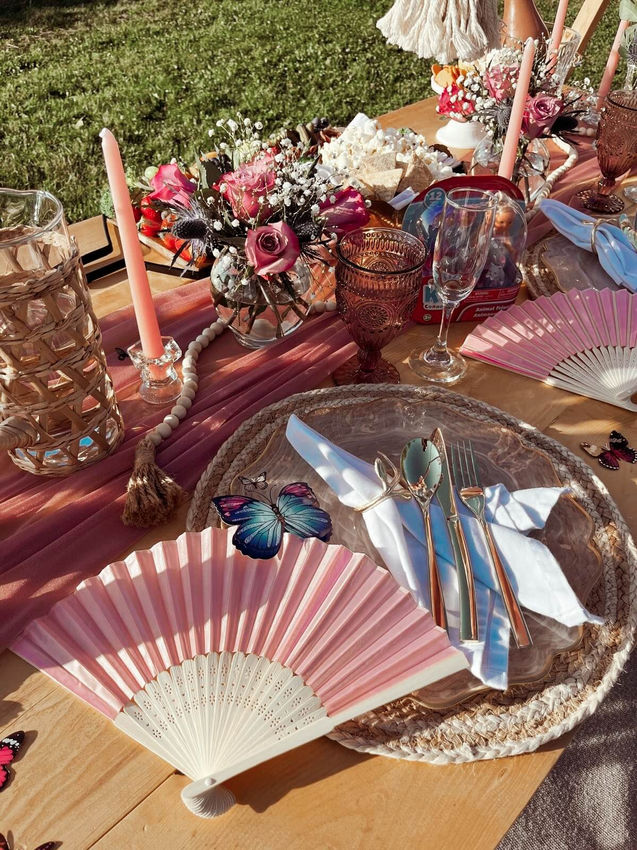Close-up of the Butterfly Garden kids picnic setup with pink decor by Sunkissed Design & Co.