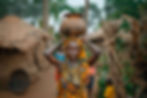 woman-carrying-pot-water-her-head (1).jpg
