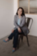 Insurance expert, Natalya Nicholson, seated professionally and looking at the camera