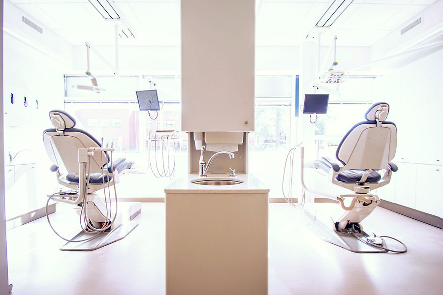 two%2520white%2520dentist%2520chairs%2520inside%2520white%2520painted%2520room_edited_edited.jpg