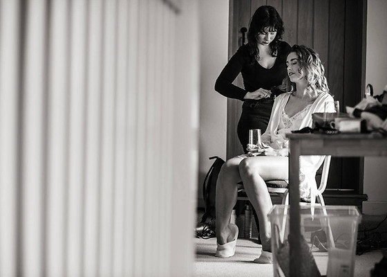 Black and white of bride gettingready