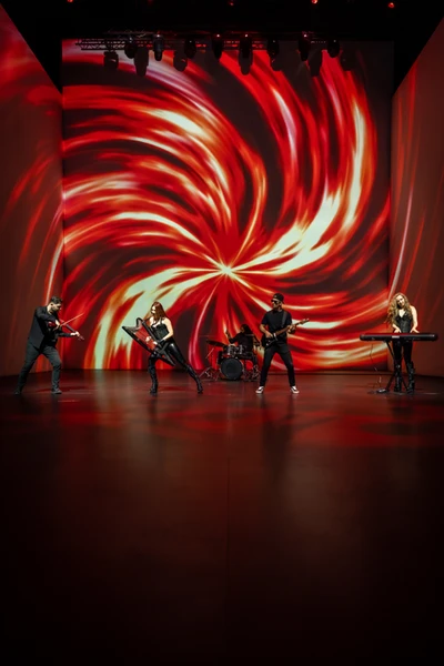 Instrumental rock fusion band performing live in Dubai with electric harp, electric violin, guitar, keyboards and drums.