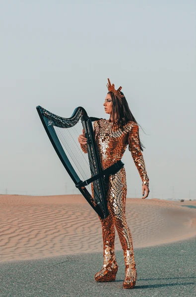 Mirror suit roaming harp performance by professional harpist Slavrada for luxury weddings, corporate events, gala dinners and private celebrations in Dubai.