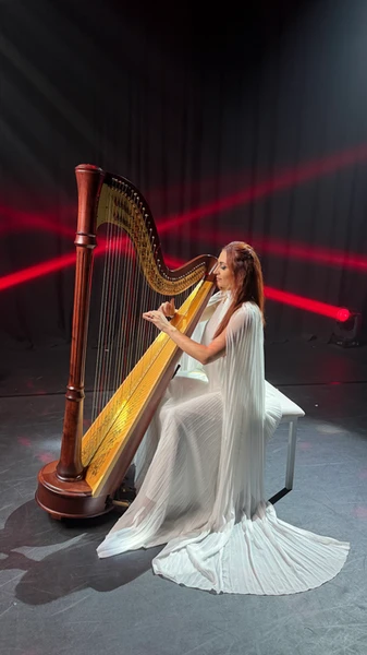 Acoustic harp performance by professional harpist Slavrada for luxury weddings, corporate events, gala dinners and private celebrations in Dubai.