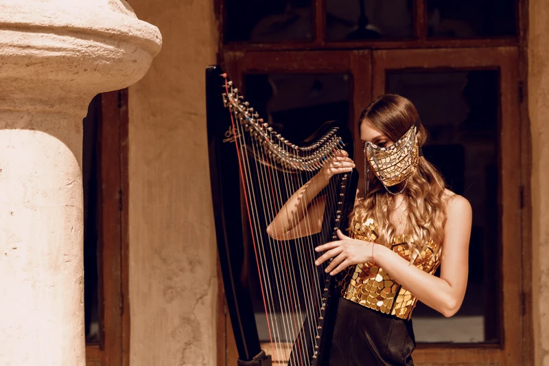 Electric roaming, mobile harp performance by professional harpist Slavrada for luxury weddings, corporate events, gala dinners and private celebrations in Dubai.