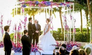 bride and groom standing at altar for ceremony