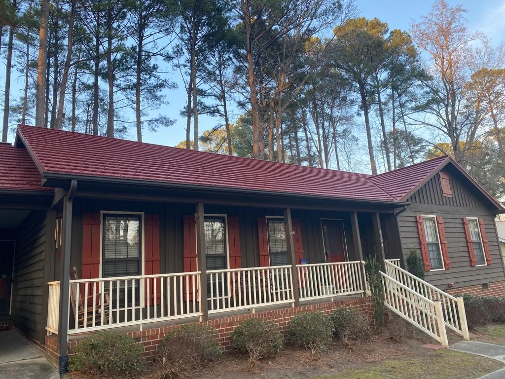 Rustic metal shingle roofing