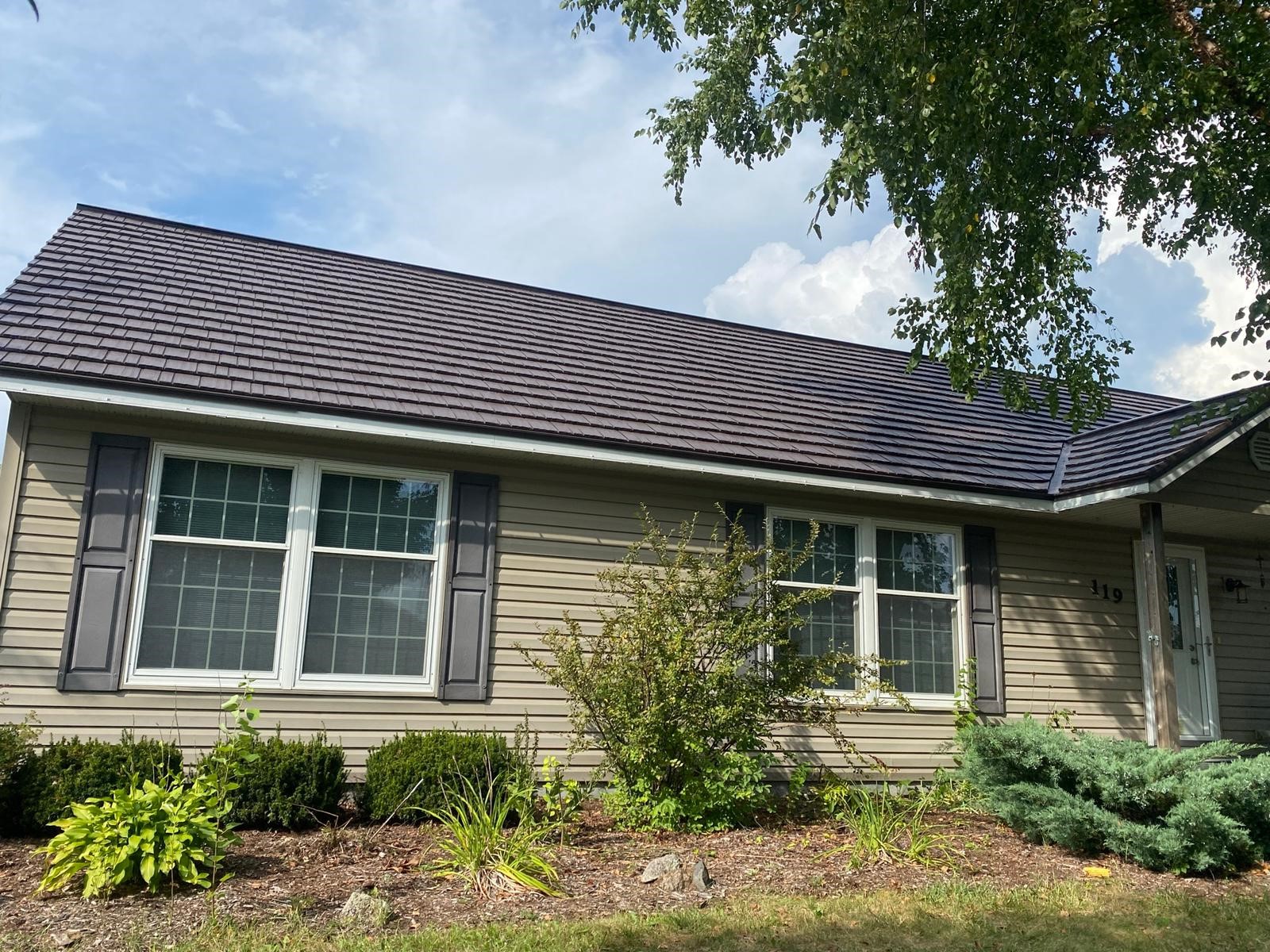 Rustic Shingles completed project by Milan's Roofing