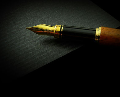 Fountain pen on a black background