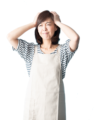 困って頭を抱えている女性