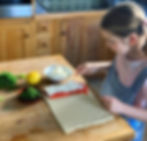 Claudine's youngest daughter spreads creamy cream cheese over the organic salmon for this healthy and quick to make but delicious salmon en croute recipe, even a child can cook it