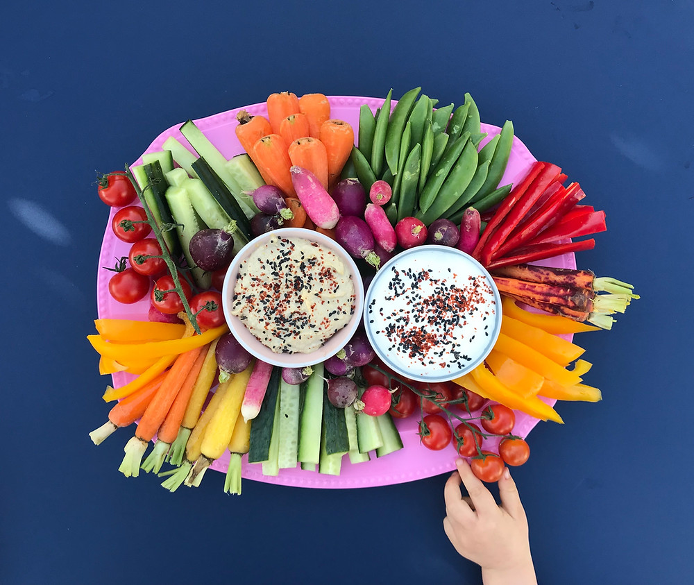 Create healthy and easy to assemble rainbow platter using fresh fruit, vegetables and dips