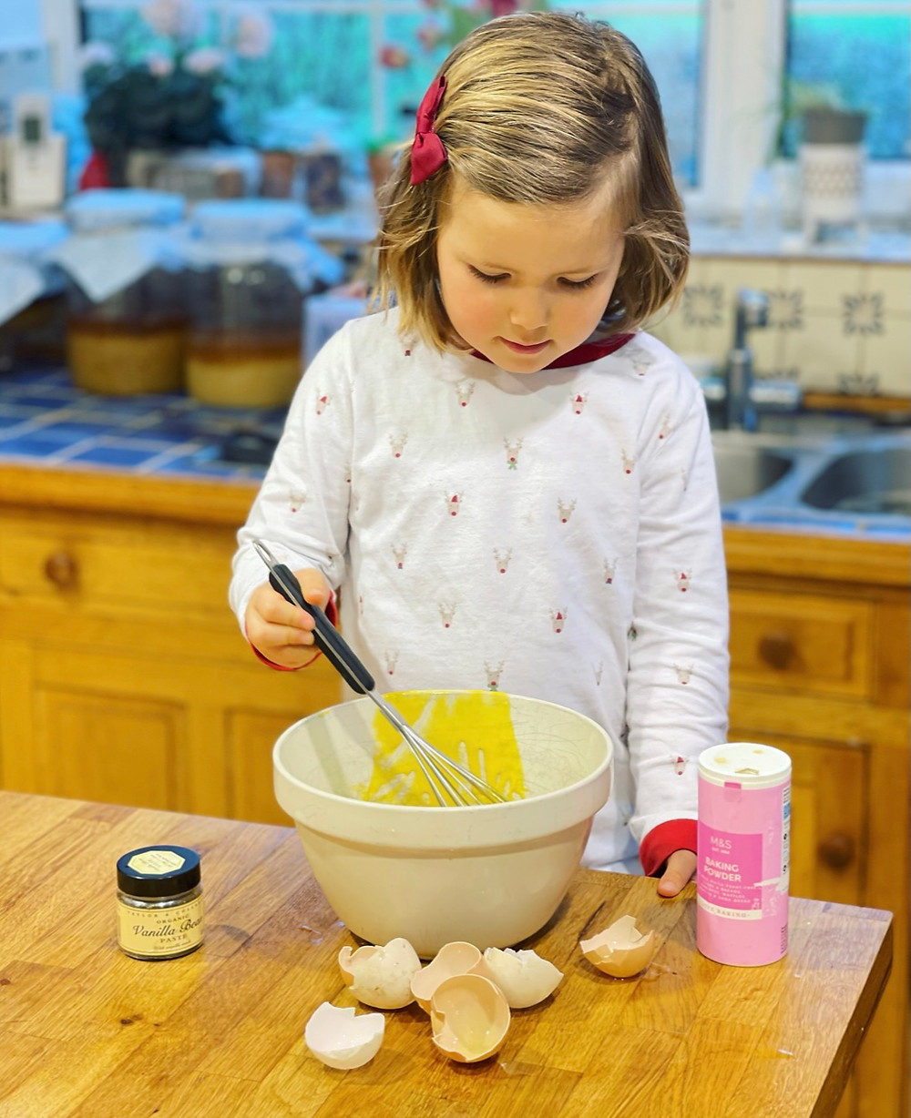 Claudine Boulstridge's youngest child uses a whisk when making a tasty yet healthy and quick to make cake recipe