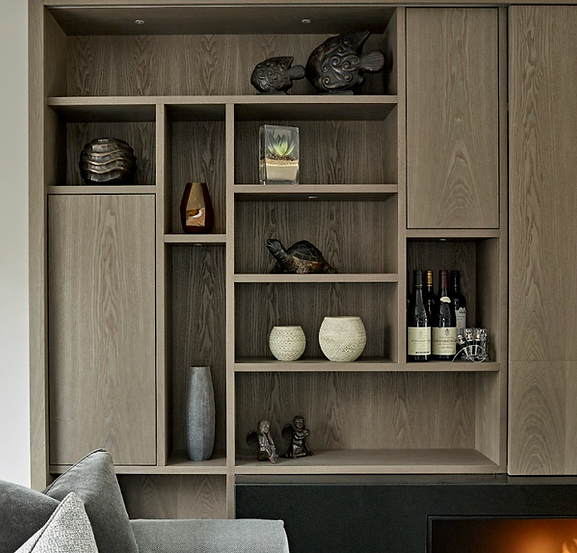 Bespoke joinery design with integrated shelving, custom storage and contemporary wood cabinetry in a luxury interior