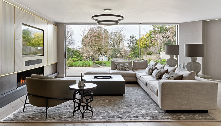 Contemporary living room with floor-to-ceiling glazing connecting interior design to the garden
