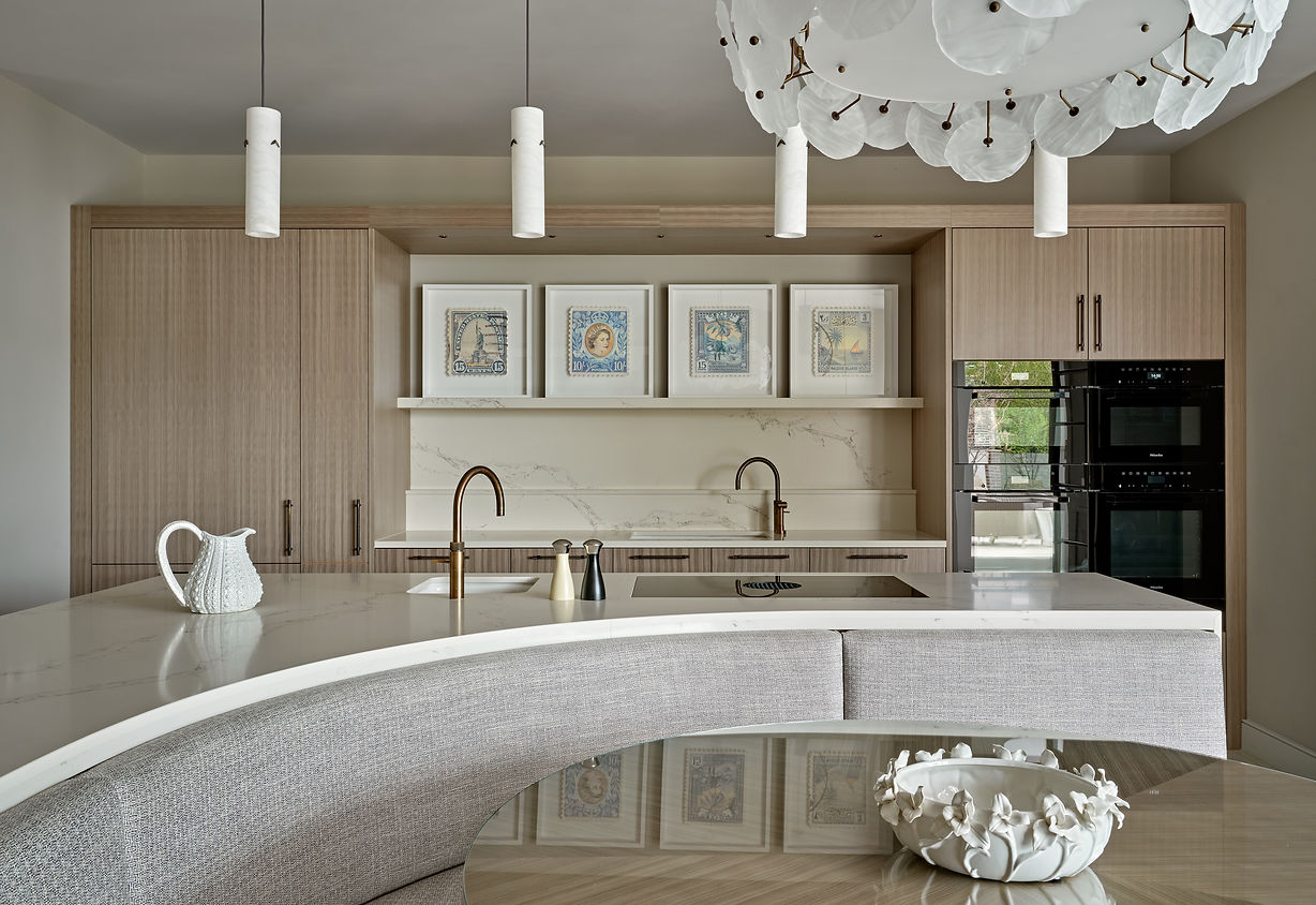 Dining area with statement chandelier, bespoke joinery and contemporary furniture design