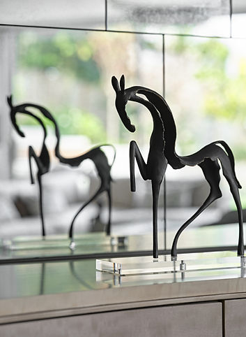 Decorative sculpture styling adding artistic detail to a luxury living space
