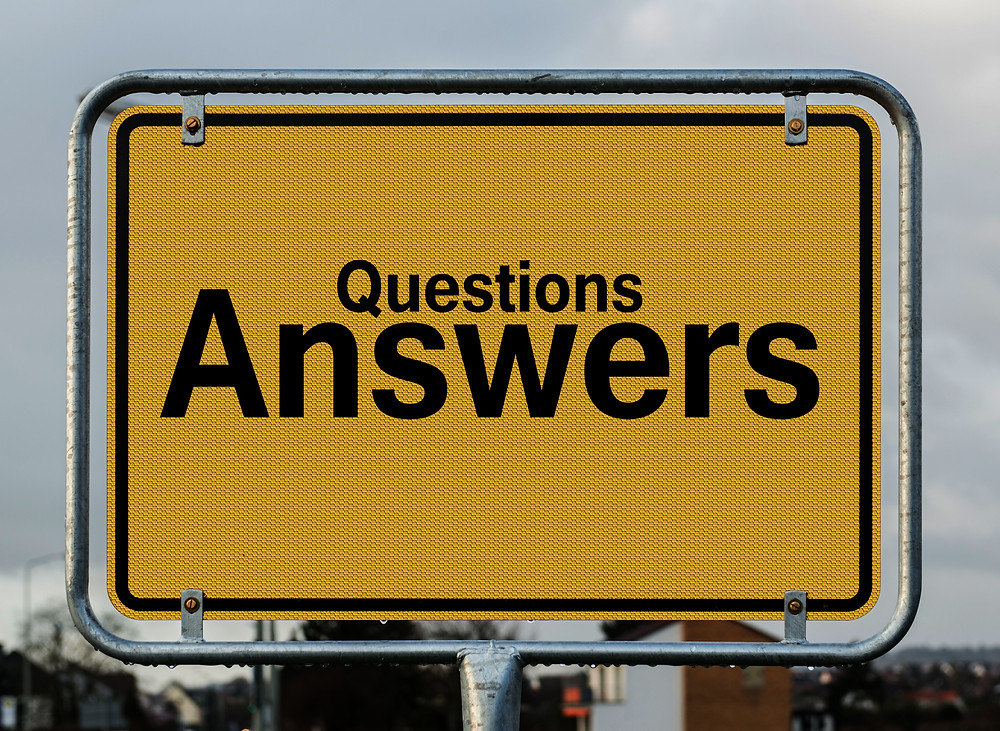 questions, answers, yellow sign