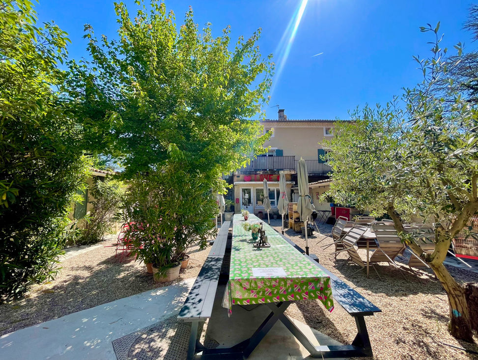 A giant table for outdoor meals at Mas Saint-Gens, a large Provençal holiday cottage