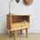 Miniature : Chevet vintage en bois rénové avec un tiroirs , une niche de rangement et bouton doré"