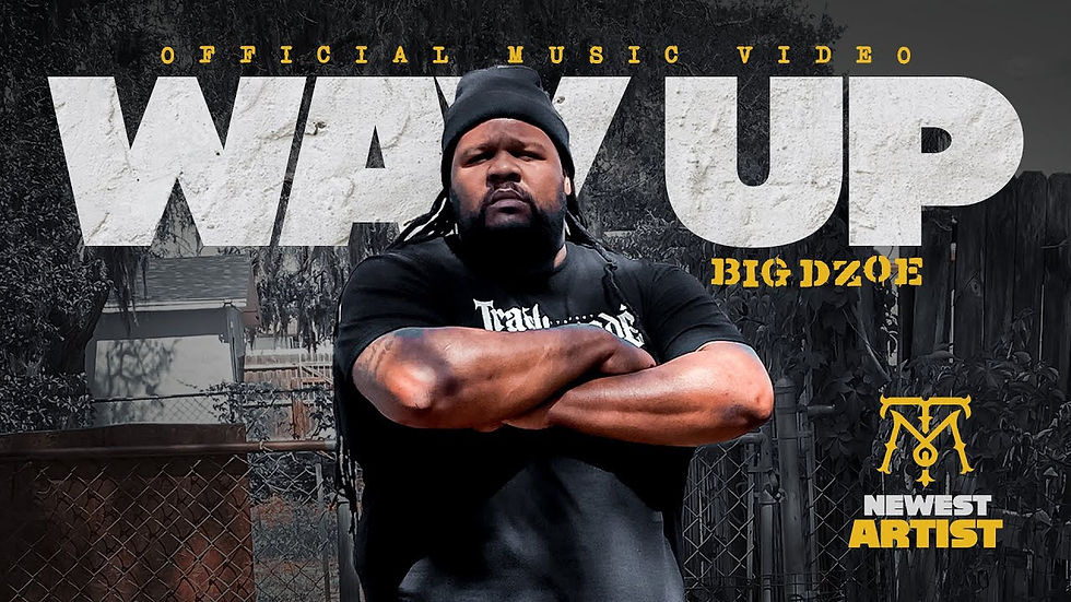 Big Dzoe standing with arms crossed in front of a gritty urban background, promoting his official music video “Way Up” 
