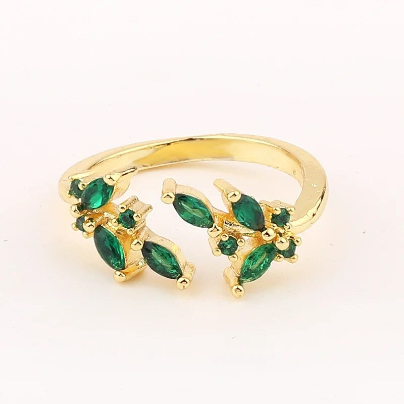 Thumbnail: Regal Green Stone Rings: Elegant Vintage 18K Gold-Plated Rhinestone Jewelry 