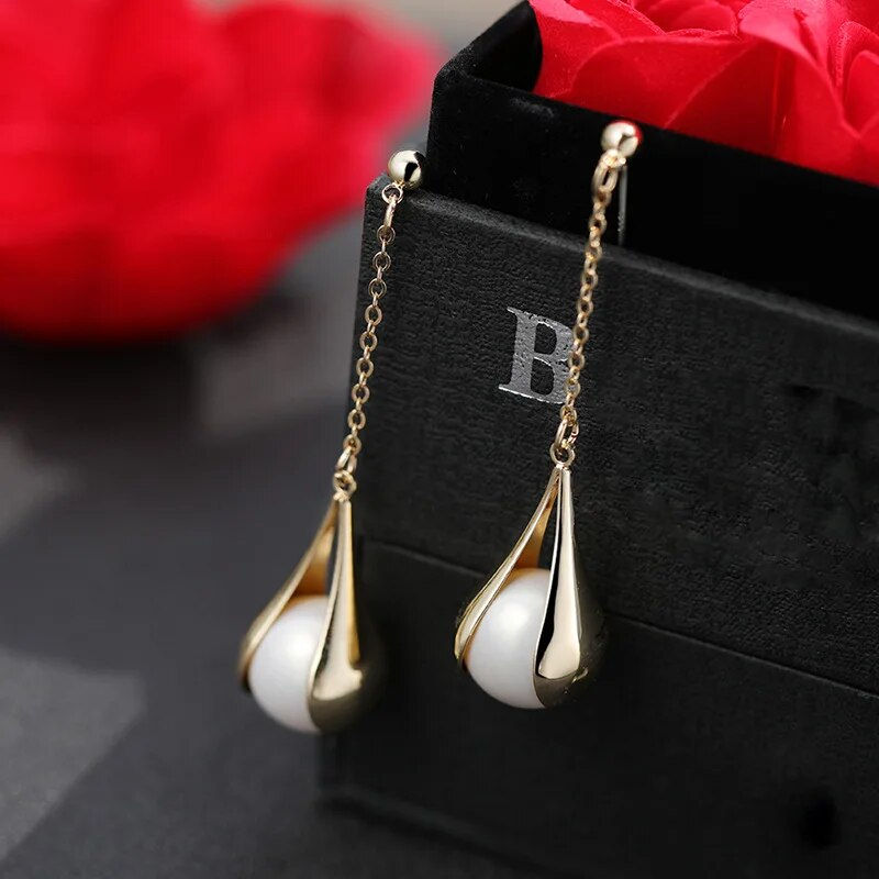 Thumbnail: Pearl Cascade: Luxe Designer gold Drop Earrings for Women
