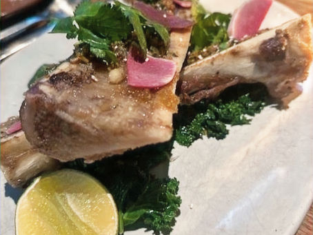 The next time you’re in Austin, make a reservation at this hot spot for bone marrow tacos.