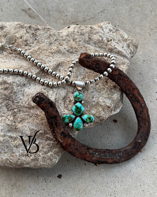 This stunning 5-stone pendant was handcrafted using Sonoran Mountain. It’s sterling silver and handmade in Stephenville, Texas.