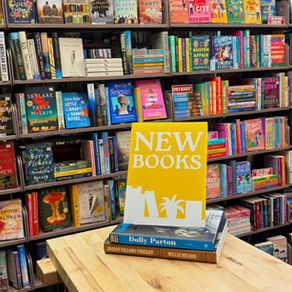 Frames Etc. revamps its bookstore with 1,500 new releases and charming place to sit and read; grand opening on Saturday.
