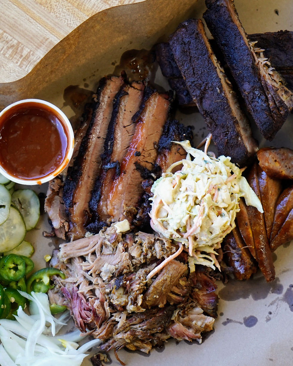 Dishes and sides from Sidecar Smoke Shack...