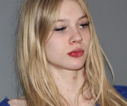 Young woman charged with criminally negligent homicide that killed mother and son suspected of drunk driving.