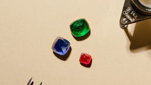 Caram presents blue sapphire, green emerald, and red ruby.