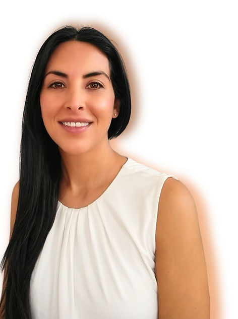 woman smiling with well-being and peace of mind in the present.