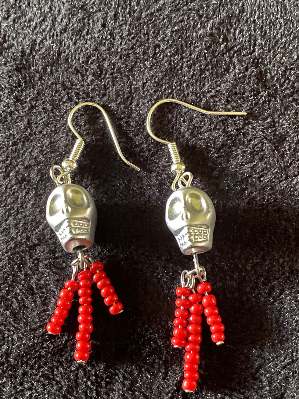 Thumbnail: Skull charm strand earrings