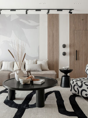 Modern living room with natural light, bold patterns and textured fabrics