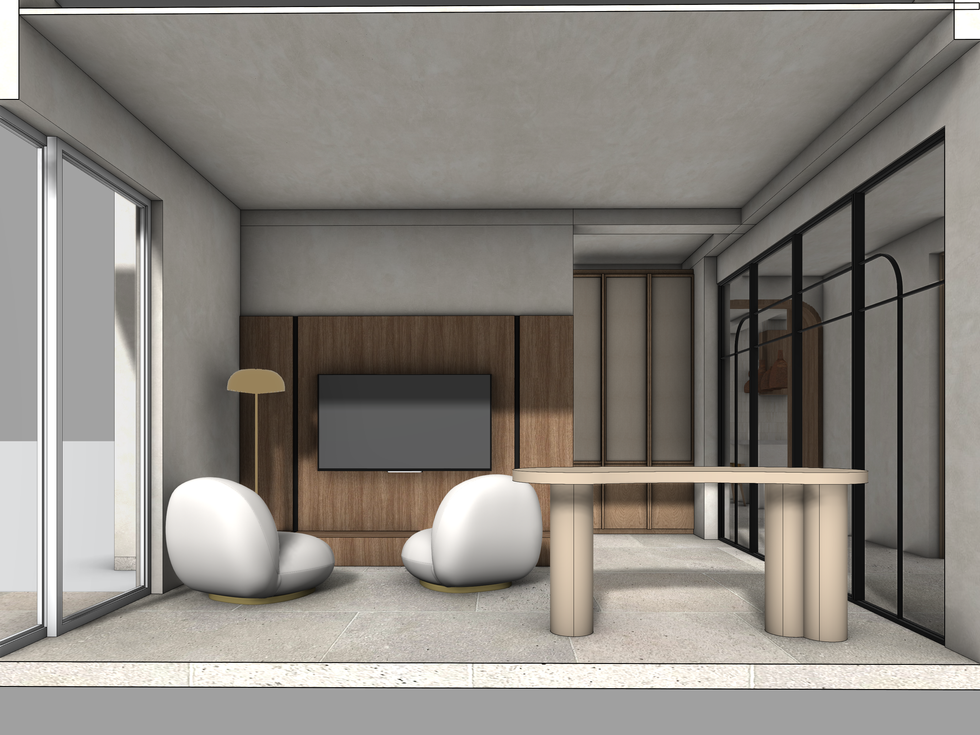 Minimalist room with modern chairs and large windows.