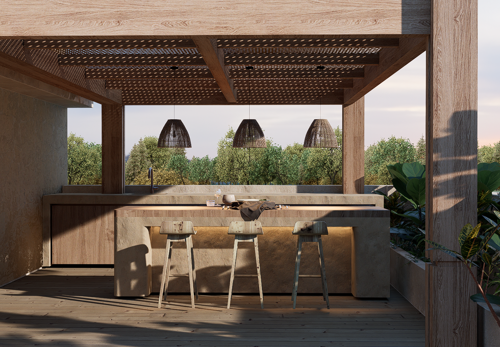 Outdoor wooden bar with stools and hanging lights.