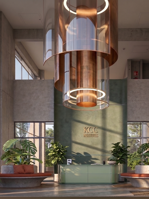 Modern university interior with large chandelier and plants.
