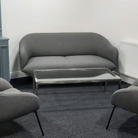 WON Design grey upholstered two-seater sofa with two matching designer lounge armchairs and rectangular glass coffee table, s