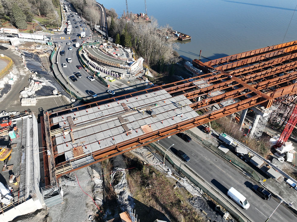 Deck panel installation over Columbia Street traffic.